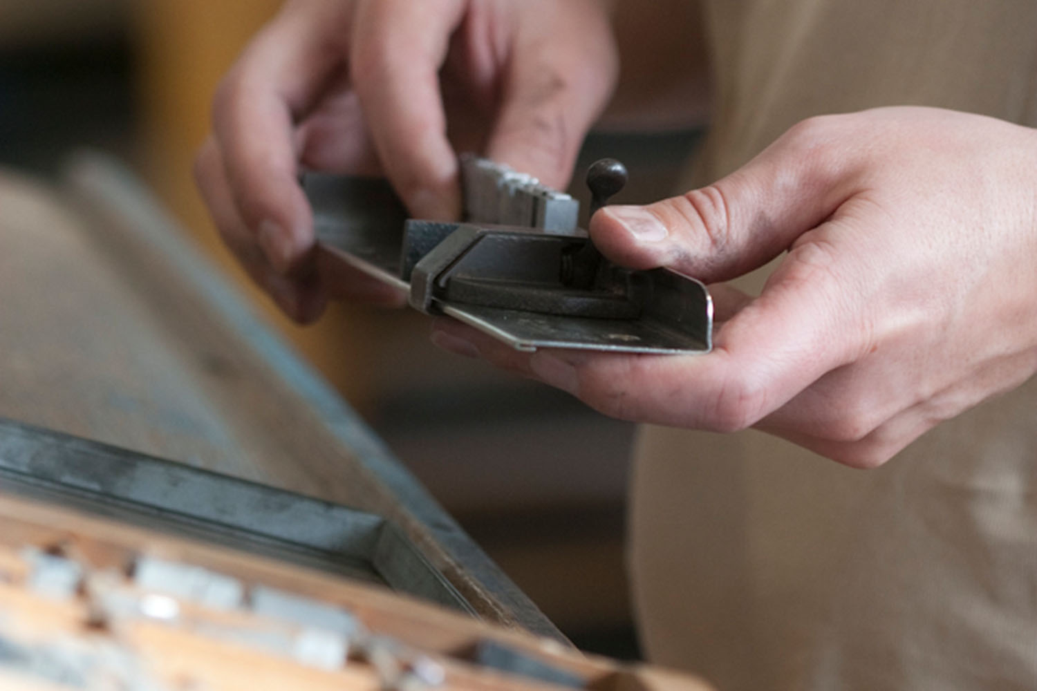typesetting with lead type at the letterpress workshop University of Plymouth